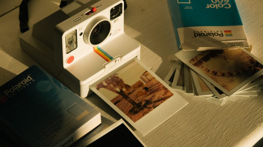 Polaroid Camera and Photographs